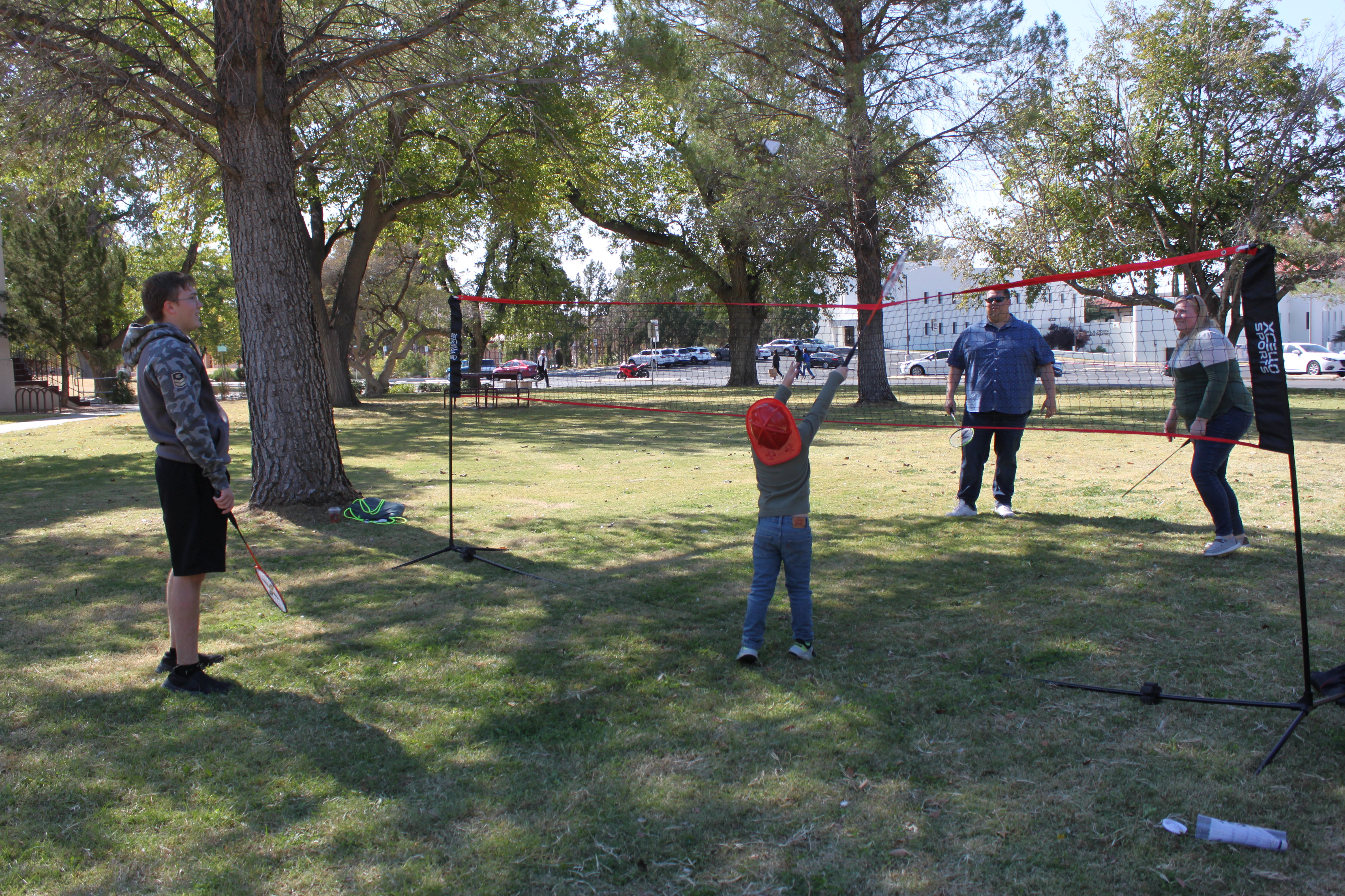 Families playing badminton